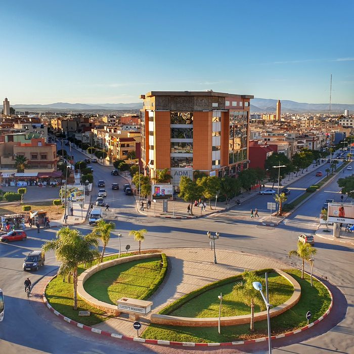 Explore the vibrant cityscape of Oujda, Morocco from above, capturing its modern architecture and bustling streets.